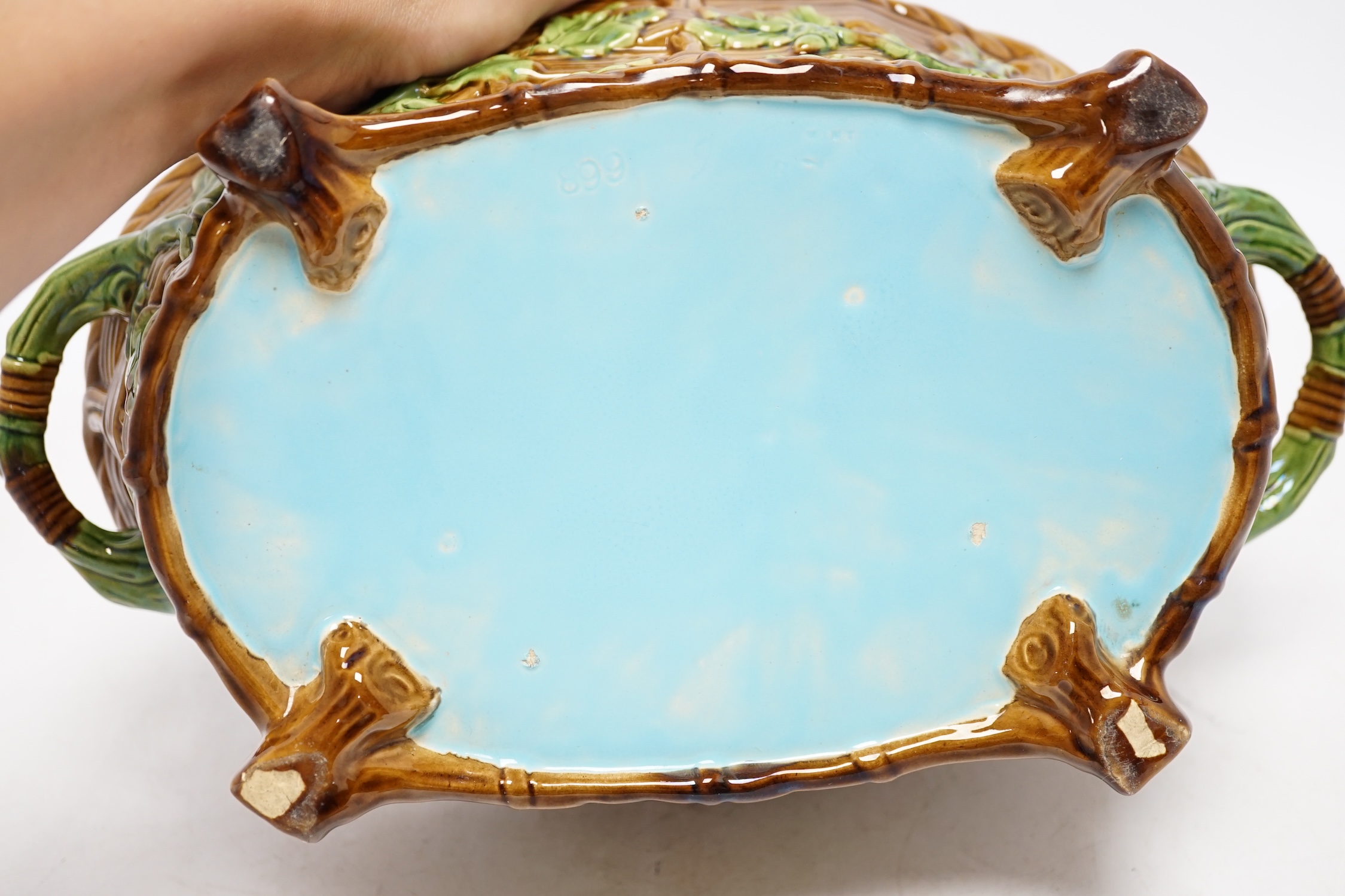 A Minton Majolica game pie dish and cover, 32cm long. Condition - good